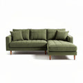 Green fabric sectional sofa with adjustable chaise lounge and throw pillows