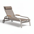 Adjustable outdoor lounge chair with padded headrest and wheels grey color